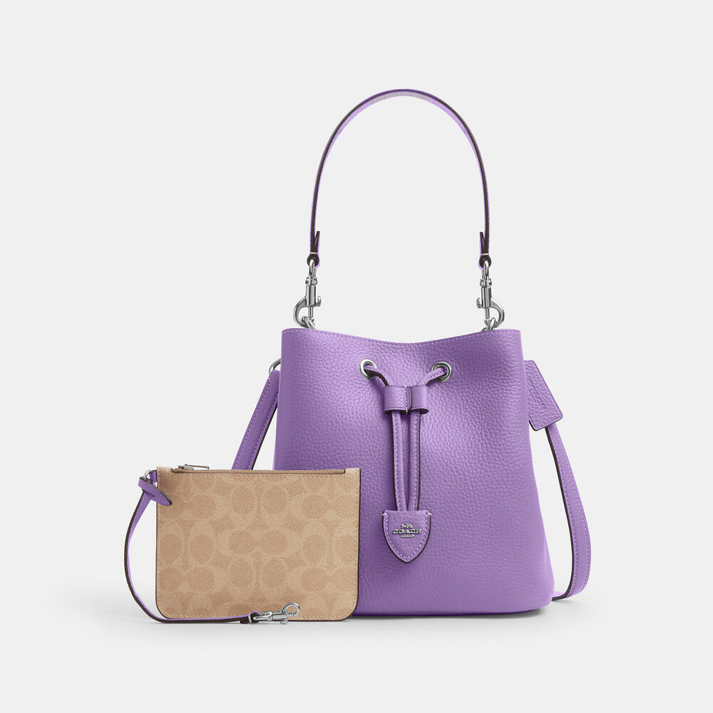 NWT coach!! Rowan Bucket Bag 💜
COLOR: SILVER/IRIS